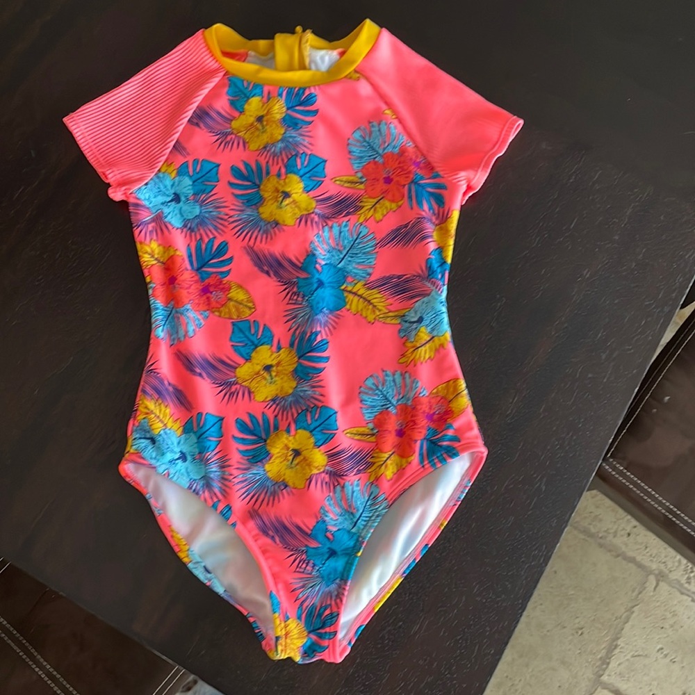 Girls one piece swimsuit.  Size 10-12.  No stains.